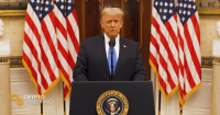 Donald Trump delivering a speech at a podium with the US presidential seal, flanked by two American flags in a formal room.