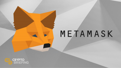 Metamask logo with a geometric fox face on a gray background with the text "METAMASK" in bold, promoting the cryptocurrency wallet.