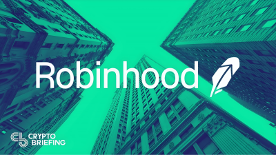 "Robinhood logo overlaid on a cityscape with tall buildings looking up from ground level."