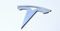 Tesla shares climb despite 16% drop in Q4 deliveries