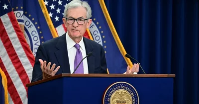 Federal Reserve officials warn of potential interest rate hikes if inflation stays sticky