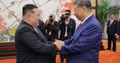Xi Jinping visits North Korea for first meeting with Kim Jong Un in seven years