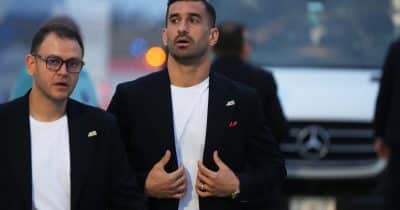 Iran’s World Cup team arrives in Mexico wearing commemorative pins for missile strike victims