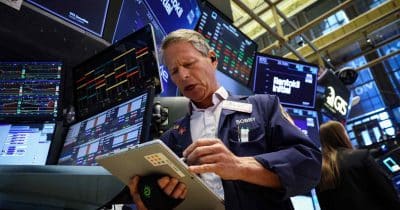 Dow hits record close as Wall Street rallies on US-Iran deal, oil prices fall