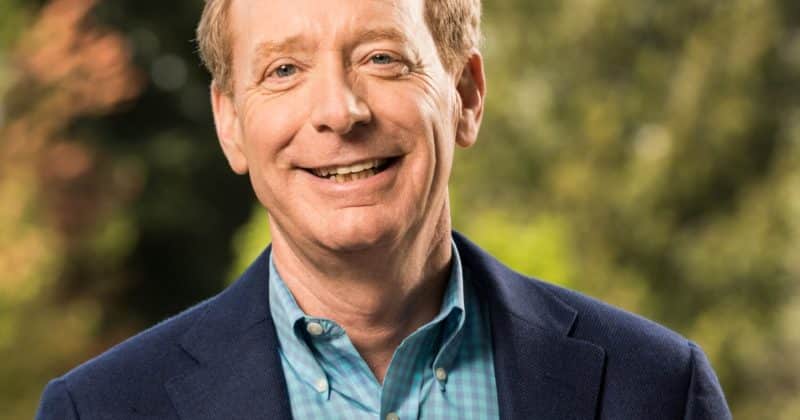 Microsoft President Brad Smith criticizes tech moguls’ AI warnings as hypocritical and self-serving