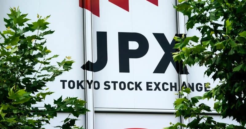 Japan and South Korea stocks hit records as dollar gains from Fed boost