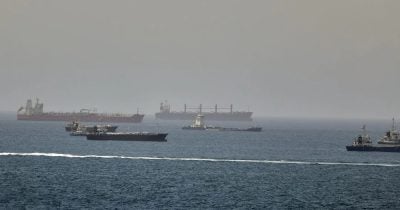 Iran strikes ship in Strait of Hormuz, complicating peace efforts