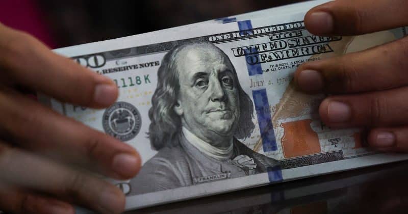 Stocks surge in stellar quarter as dollar hammers gold and yen