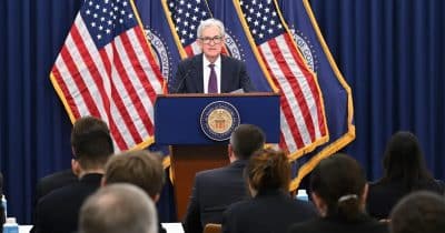 Fed acknowledges easy money policies fueled inflation, hints at 2026 rate hike