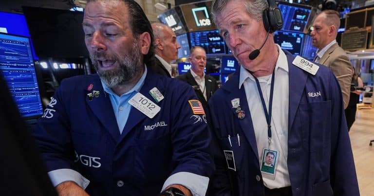 Dow heads for new record as S&P 500 and Nasdaq fall on tech rotation