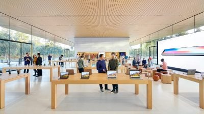 Apple hits record high as Wall Street sees demand surviving price increases