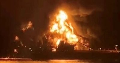 Iran fires at two ships in Strait of Hormuz as traffic hits 5-week low