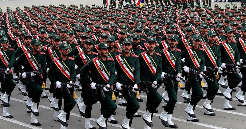 Iran Revolutionary Guards fire on Thai-flagged ship in Strait of Hormuz, sparking oil surge and crypto toll demands
