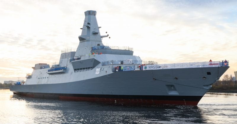 UK Navy vessel near Oman hit by unidentified projectile, crew abandons ship