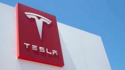 Tesla posts record $28.2B revenue but shares fall after earnings miss