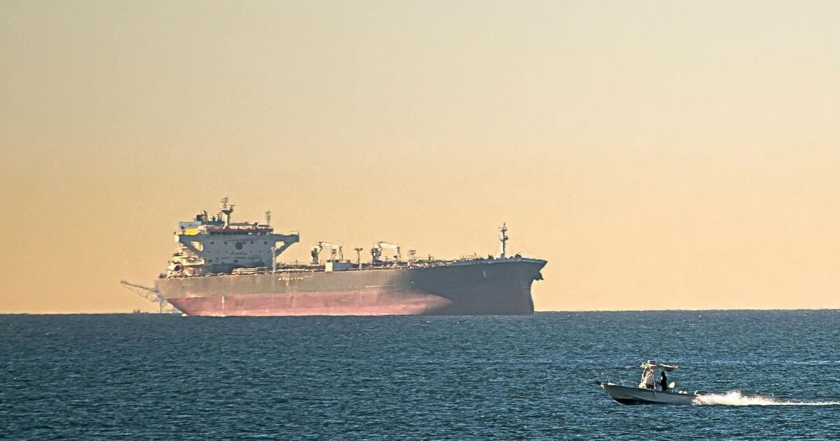 Tanker hit by unknown projectile near Oman, raising Strait of Hormuz security risks