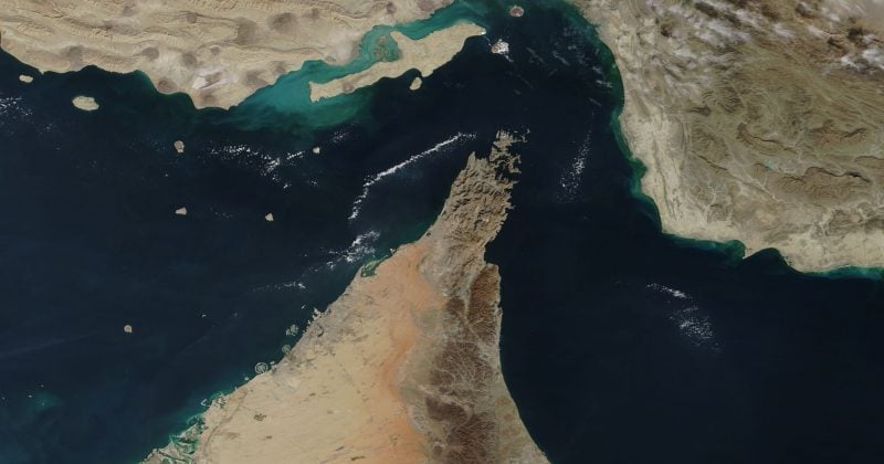 Al hadath reports exclusive footage of smoke rising from ship hit near Strait of Hormuz