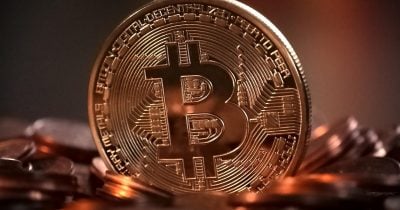 Bitcoin Holds Near $65K as Stagflation Fears Hit Markets