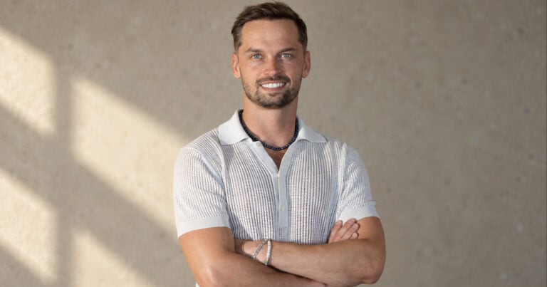 Confident Man in Knit Polo